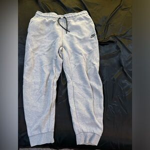grey nike tech pants size large